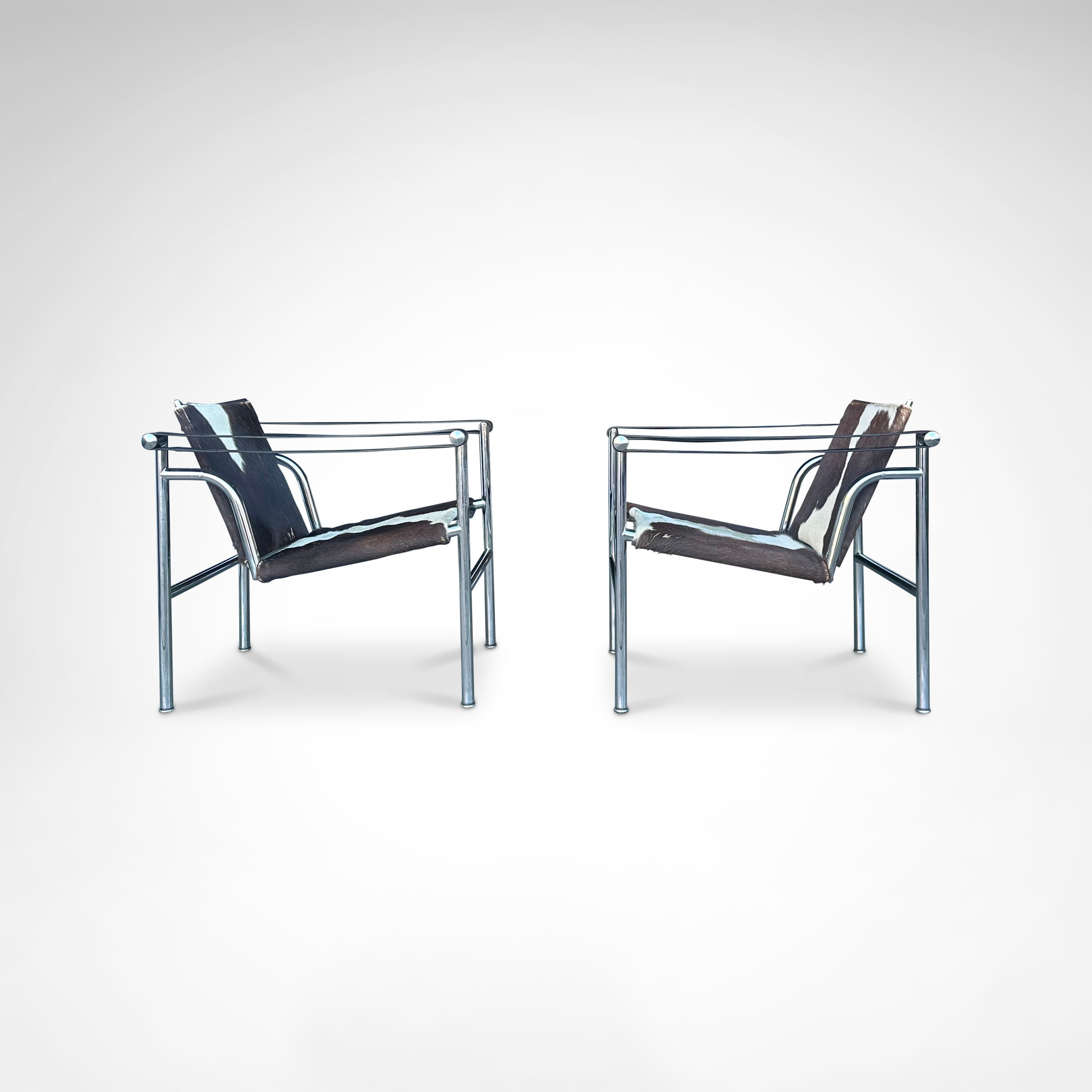 Set_of_2_LC1_Basculant_Chairs_by_Le_Corbusier_for_Cassina,_1970s,_Italy