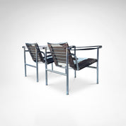 Set_of_2_LC1_Basculant_Chairs_by_Le_Corbusier_for_Cassina,_1970s,_Italy