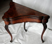 Georgian_Flamed_Mahogany_Fold-Over_Game_Table,_England_Late_18th_Century
