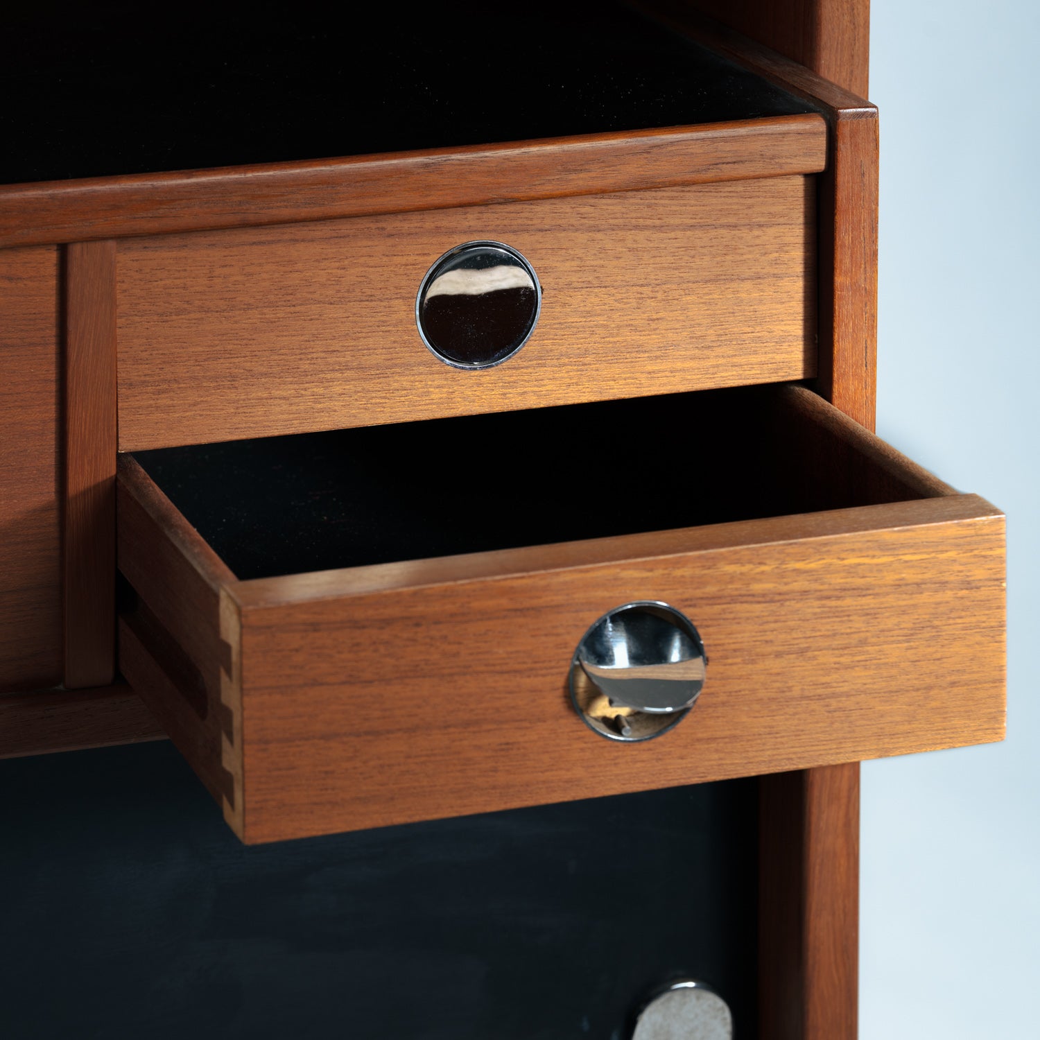 Erik_Buch_boomerang_dry_bar_cabinet_in_teak_for_Dyrlund,_1960s