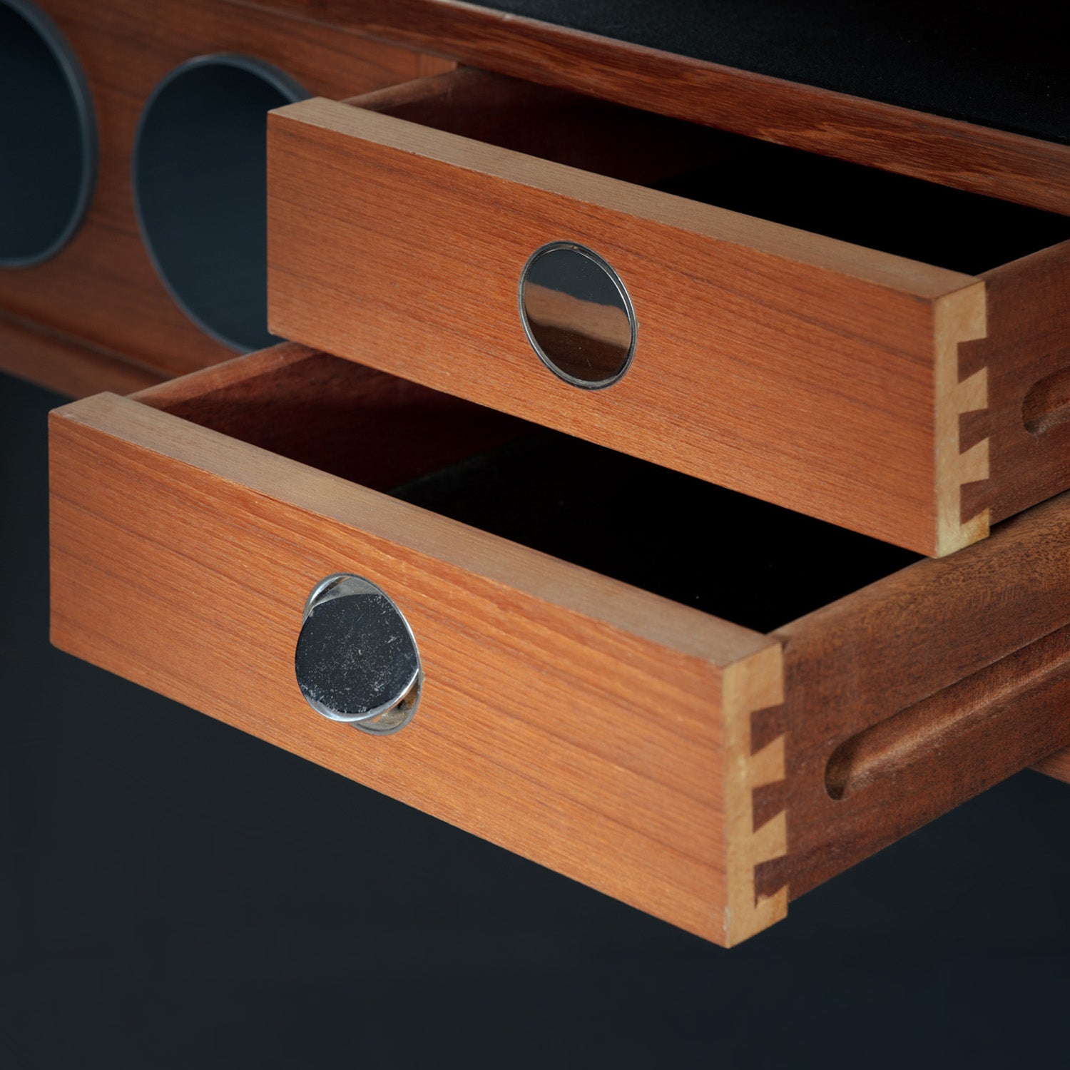 Erik_Buch_boomerang_dry_bar_cabinet_in_teak_for_Dyrlund,_1960s