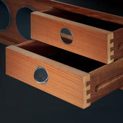 Erik_Buch_boomerang_dry_bar_cabinet_in_teak_for_Dyrlund,_1960s