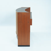 Erik_Buch_boomerang_dry_bar_cabinet_in_teak_for_Dyrlund,_1960s
