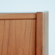 Erik_Buch_boomerang_dry_bar_cabinet_in_teak_for_Dyrlund,_1960s