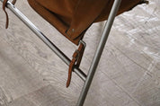 Erik_Ole_Jørgensen_for_Bovirke_Easy_Chair_in_Cognac_Suede_and_Metal,_Denmark,_1953