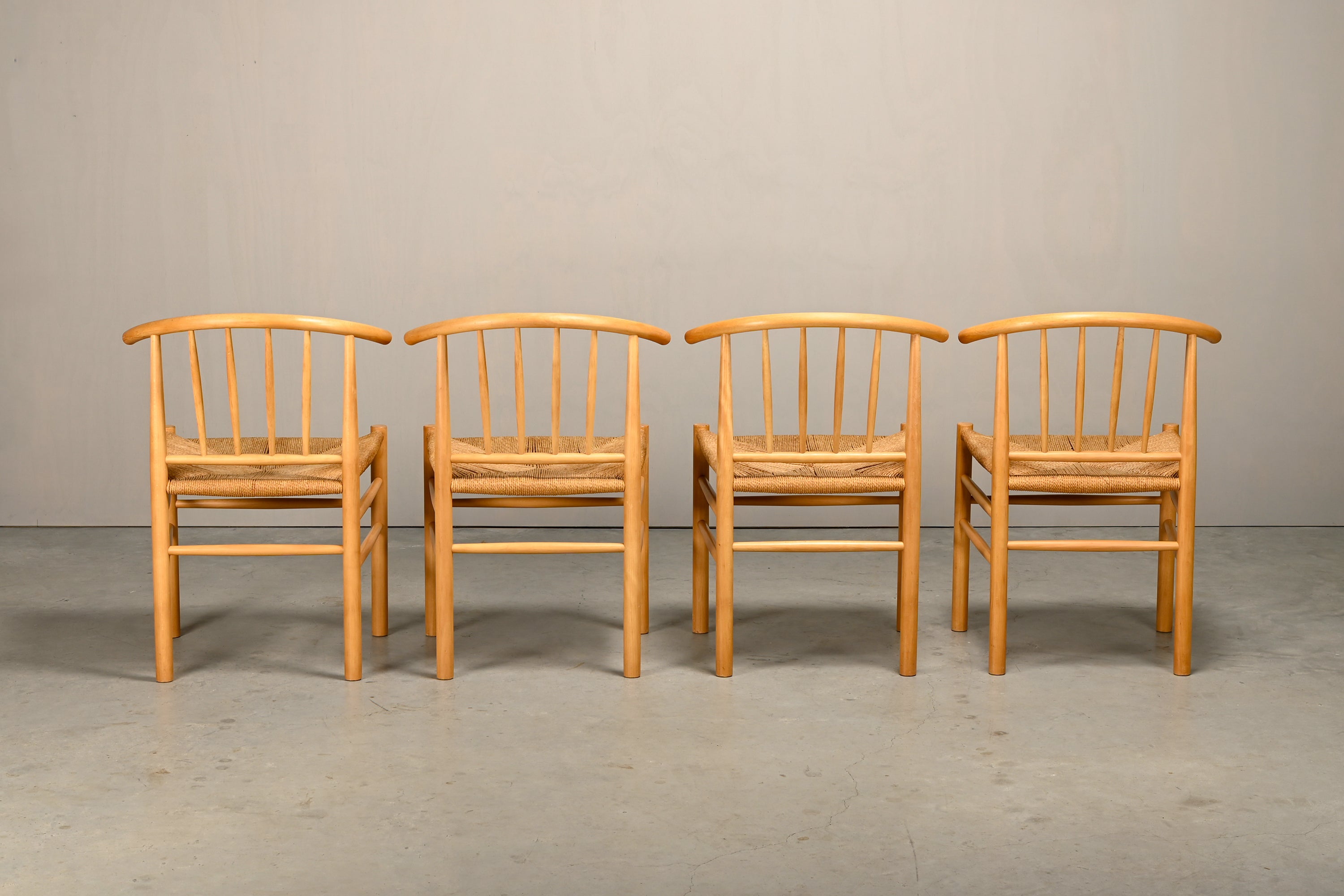 Set_of_4_J151_Dining_Chairs_by_Erik_Ole_Jørgensen_for_FDB_Møbler,_Beechwood_and_Papercord,_Denmark,_1970s