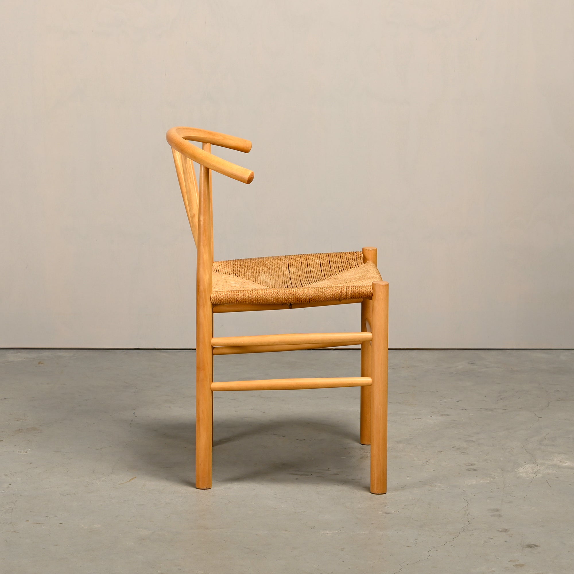 Set_of_4_J151_Dining_Chairs_by_Erik_Ole_Jørgensen_for_FDB_Møbler,_Beechwood_and_Papercord,_Denmark,_1970s