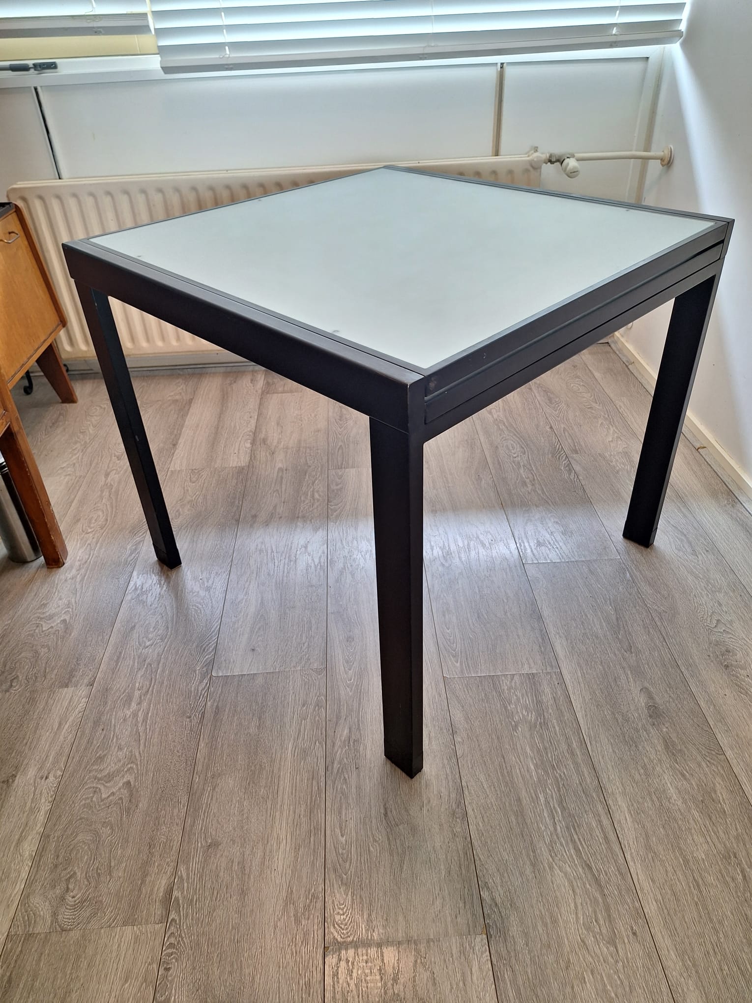 Custom_Italian_Extendable_Frosted_Glass_Dining_Table_with_Black_Metal_Frame