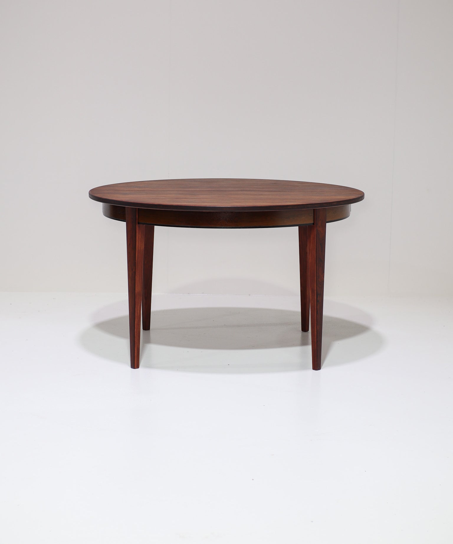 Extendable_round_dining_table_by_Omann_Jun_model_55_rosewood,_Denmark_1960s