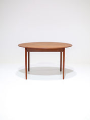 Extendable_round_dining_table_teak_Danish_vintage