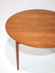Extendable_round_dining_table_teak_Danish_vintage