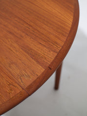 Extendable_round_dining_table_teak_Danish_vintage