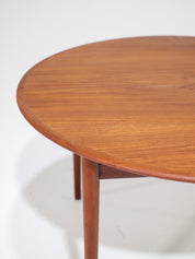 Extendable_round_dining_table_teak_Danish_vintage
