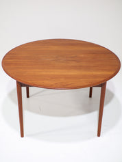 Extendable_round_dining_table_teak_Danish_vintage