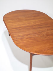 Extendable_round_dining_table_teak_Danish_vintage