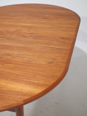Extendable_round_dining_table_teak_Danish_vintage