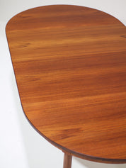 Extendable_Round_Teak_Dining_Table,_1960s,_Denmark