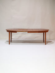 Extendable_round_dining_table_teak_vintage_Danish_1960s
