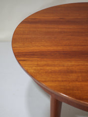 Extendable_round_dining_table_teak_vintage_Danish_1960s