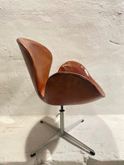 First_Edition_Arne_Jacobsen_Swan_Chair,_Original_Patinated_Leather,_1950s