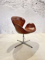 First_Edition_Arne_Jacobsen_Swan_Chair,_Original_Patinated_Leather,_1950s