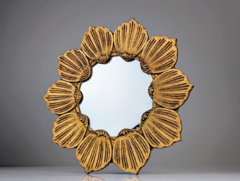 Floral_Sunburst_Mirror_in_Gilt_Wood_1950s