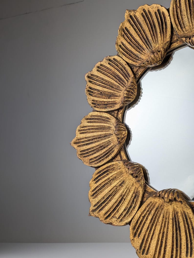 Floral_Sunburst_Mirror_in_Gilt_Wood_1950s