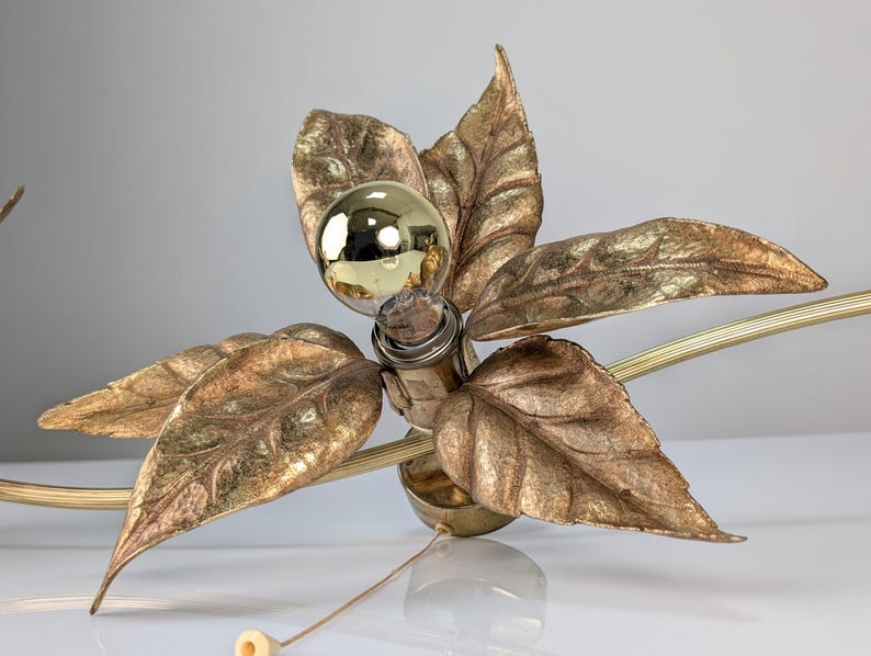 Floral_wall_lamp_by_Willy_Daro,_Belgium_1970s