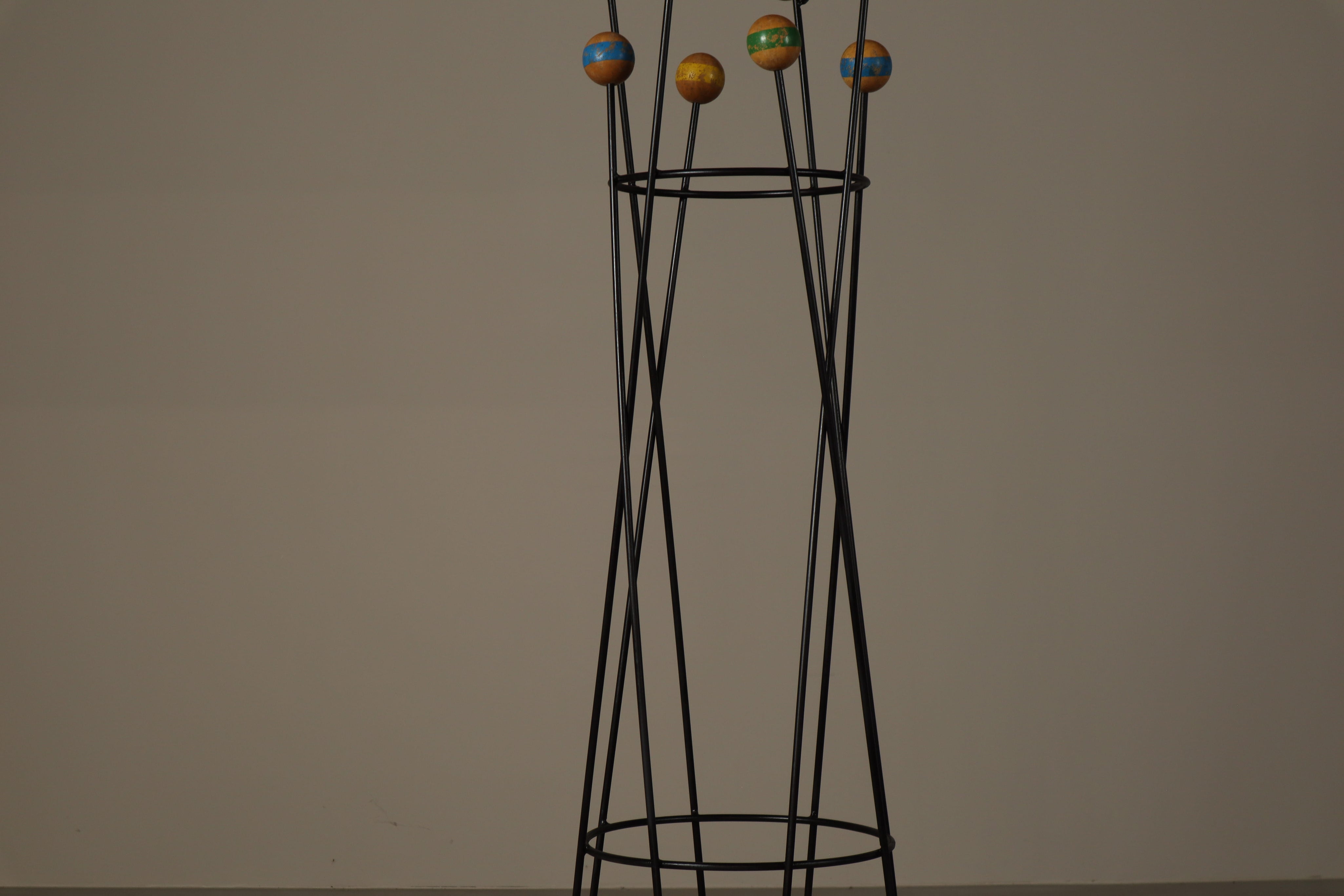 Freestanding_Coat_and_Hat_Stand_in_the_Style_of_Roger_Féraud,_Black_Metal_and_Colourful_Wooden_Balls