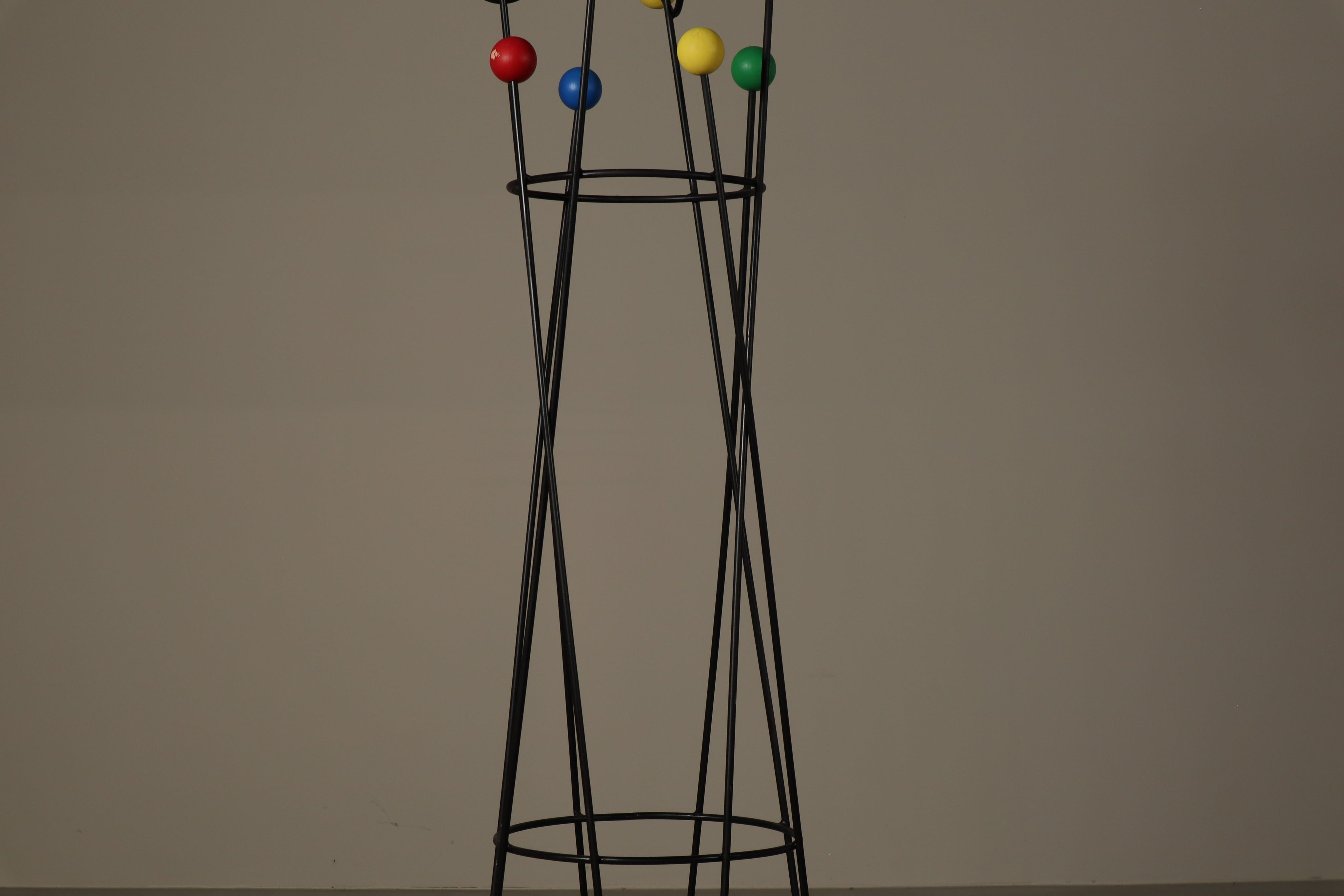 Coat_and_Hat_Stand_in_the_Style_of_Roger_Féraud,_Black_Metal_with_Colourful_Wooden_Balls