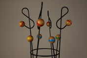 Freestanding_Coat_and_Hat_Stand_in_the_Style_of_Roger_Féraud,_Black_Metal_and_Colourful_Wooden_Balls