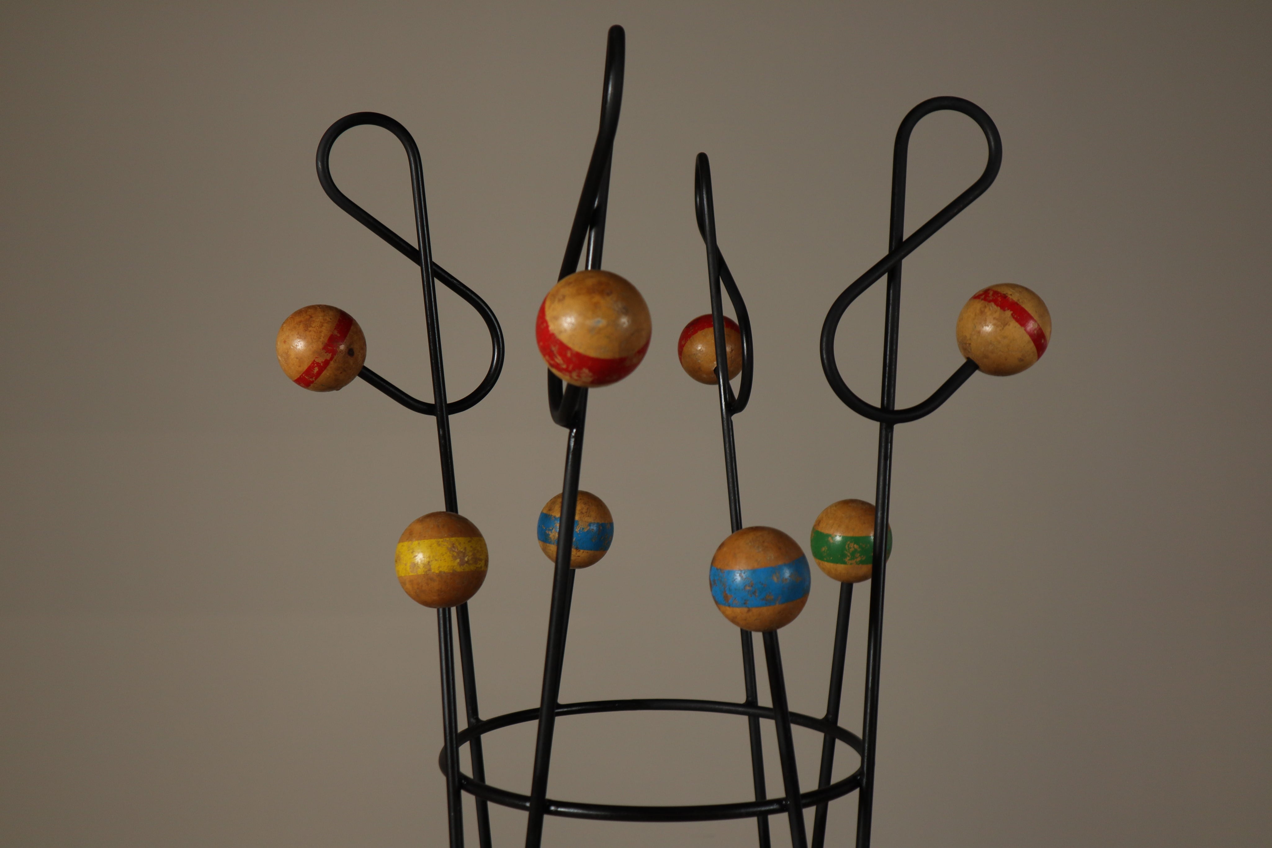 Freestanding_Coat_and_Hat_Stand_in_the_Style_of_Roger_Féraud,_Black_Metal_and_Colourful_Wooden_Balls
