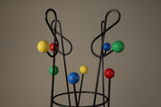 Coat_and_Hat_Stand_in_the_Style_of_Roger_Féraud,_Black_Metal_with_Colourful_Wooden_Balls
