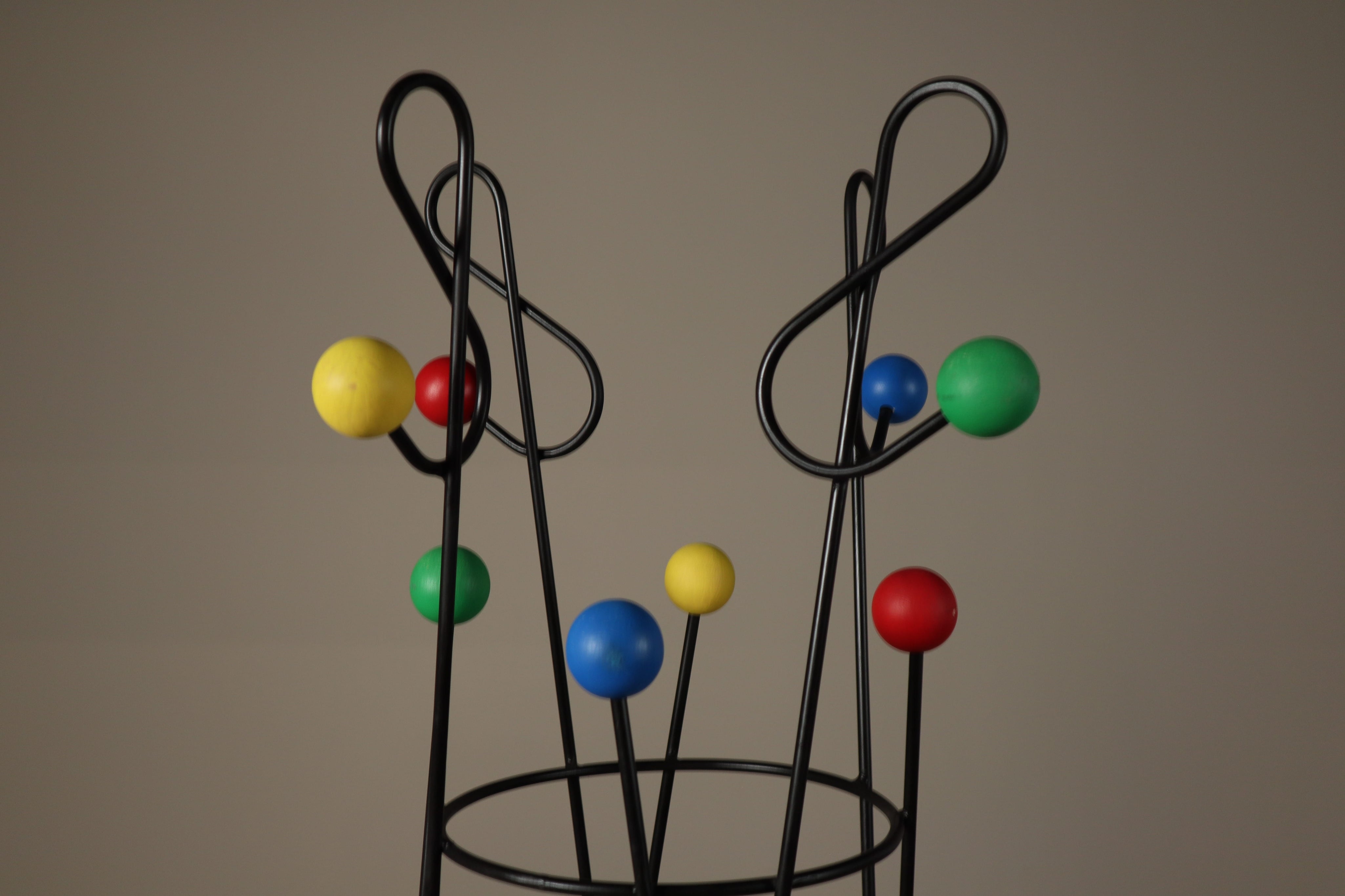 Coat_and_Hat_Stand_in_the_Style_of_Roger_Féraud,_Black_Metal_with_Colourful_Wooden_Balls