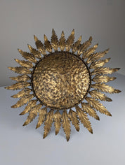Golden_sunburst_ceiling_or_wall_lamp_with_leaf_rays_1950s