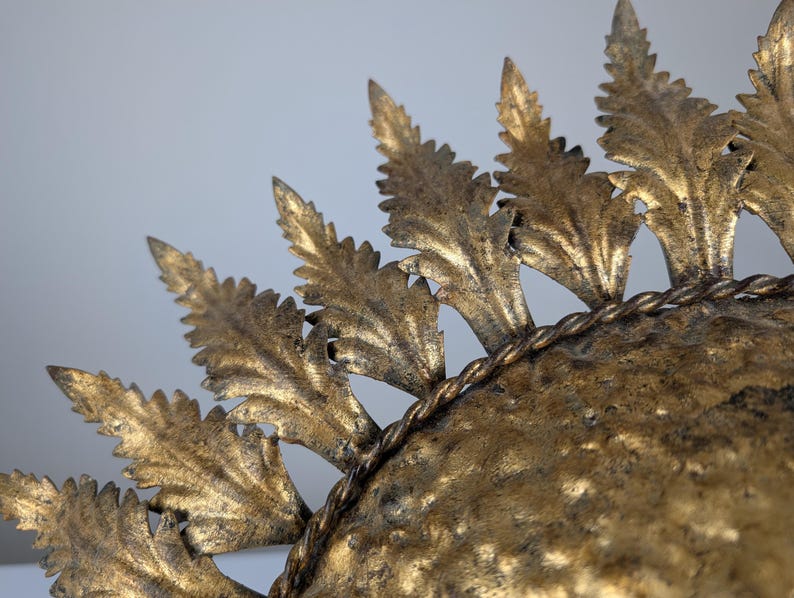 Golden_sunburst_ceiling_or_wall_lamp_with_leaf_rays_1950s