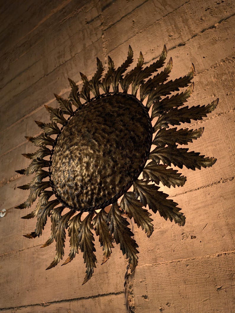 Golden_sunburst_ceiling_or_wall_lamp_with_leaf_rays_1950s