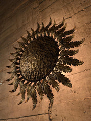 Golden_sunburst_ceiling_or_wall_lamp_with_leaf_rays_1950s