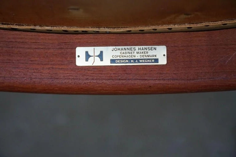 Hans_J._Wegner,_Armchair_in_Teak_&_Leather,_The_Chair_model_JH501,_1950s