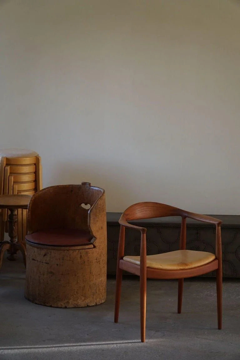 Hans_J._Wegner,_Armchair_in_Teak_&_Leather,_The_Chair_model_JH501,_1950s