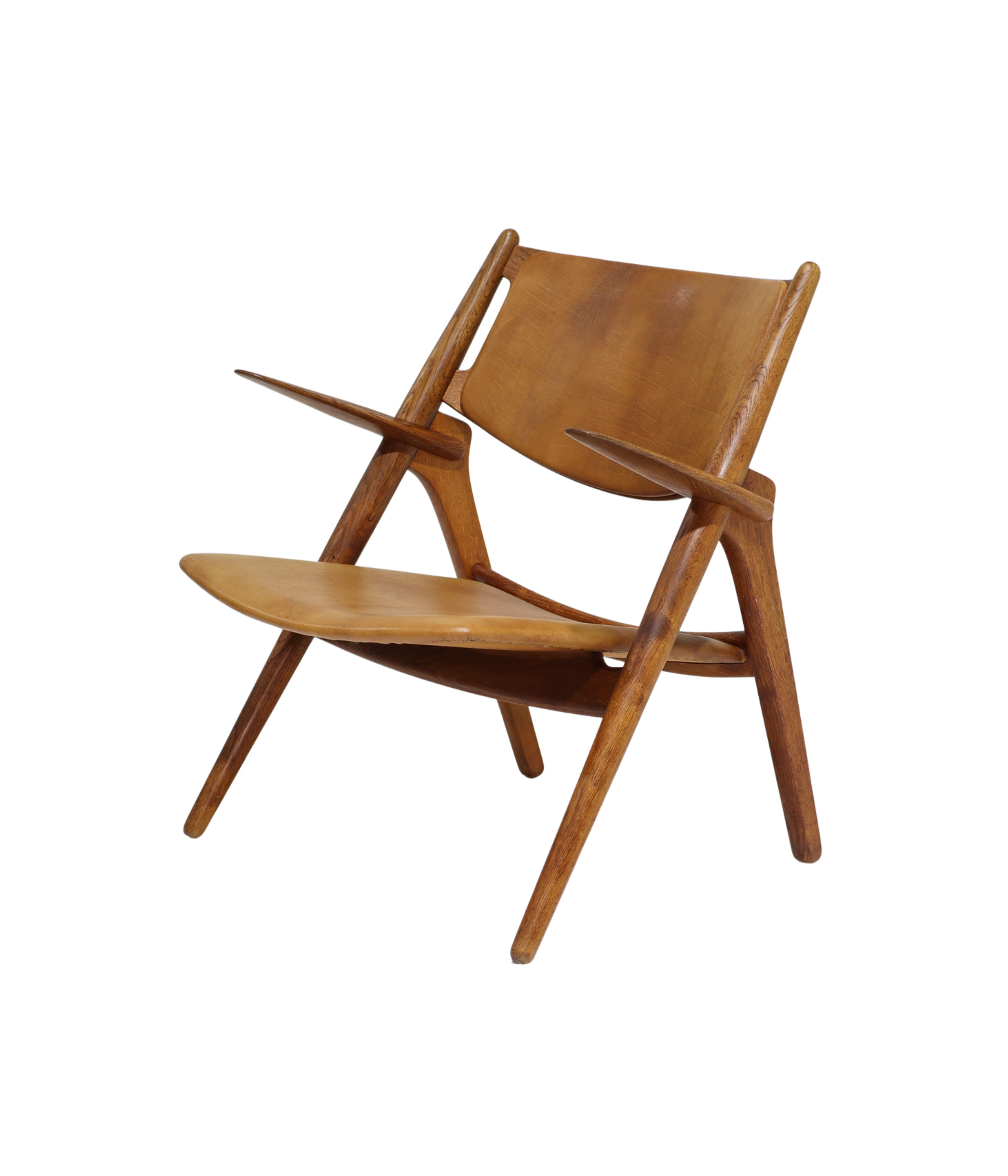 Hans_J._Wegner_CH28_“Sawbuck”_Armchair_in_Oak_and_Cognac_Leather,_1950s
