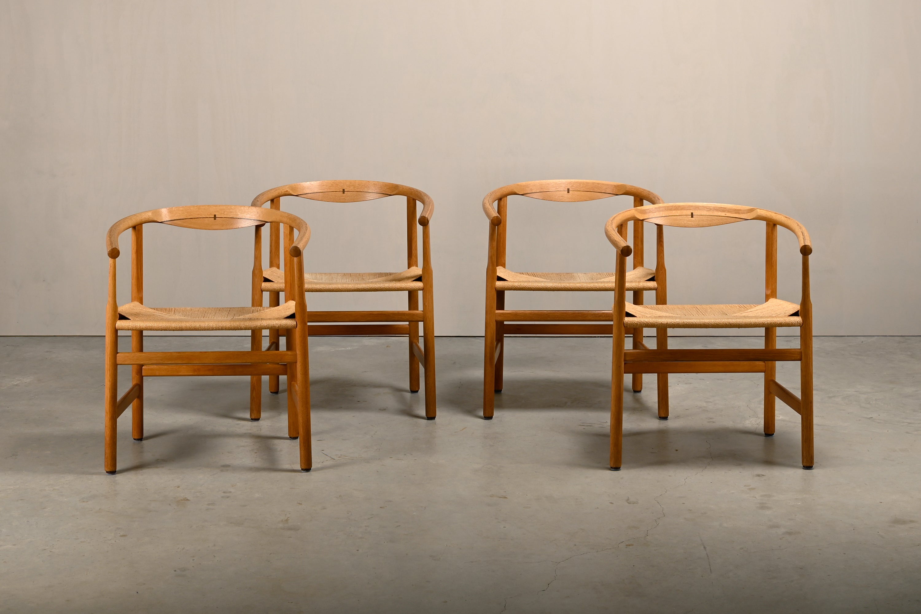 Set_of_4_Hans_J._Wegner_PP201_Dining_Chairs_for_PP_Møbler_in_Oak_and_Paper_Cord,_Denmark,_1970s