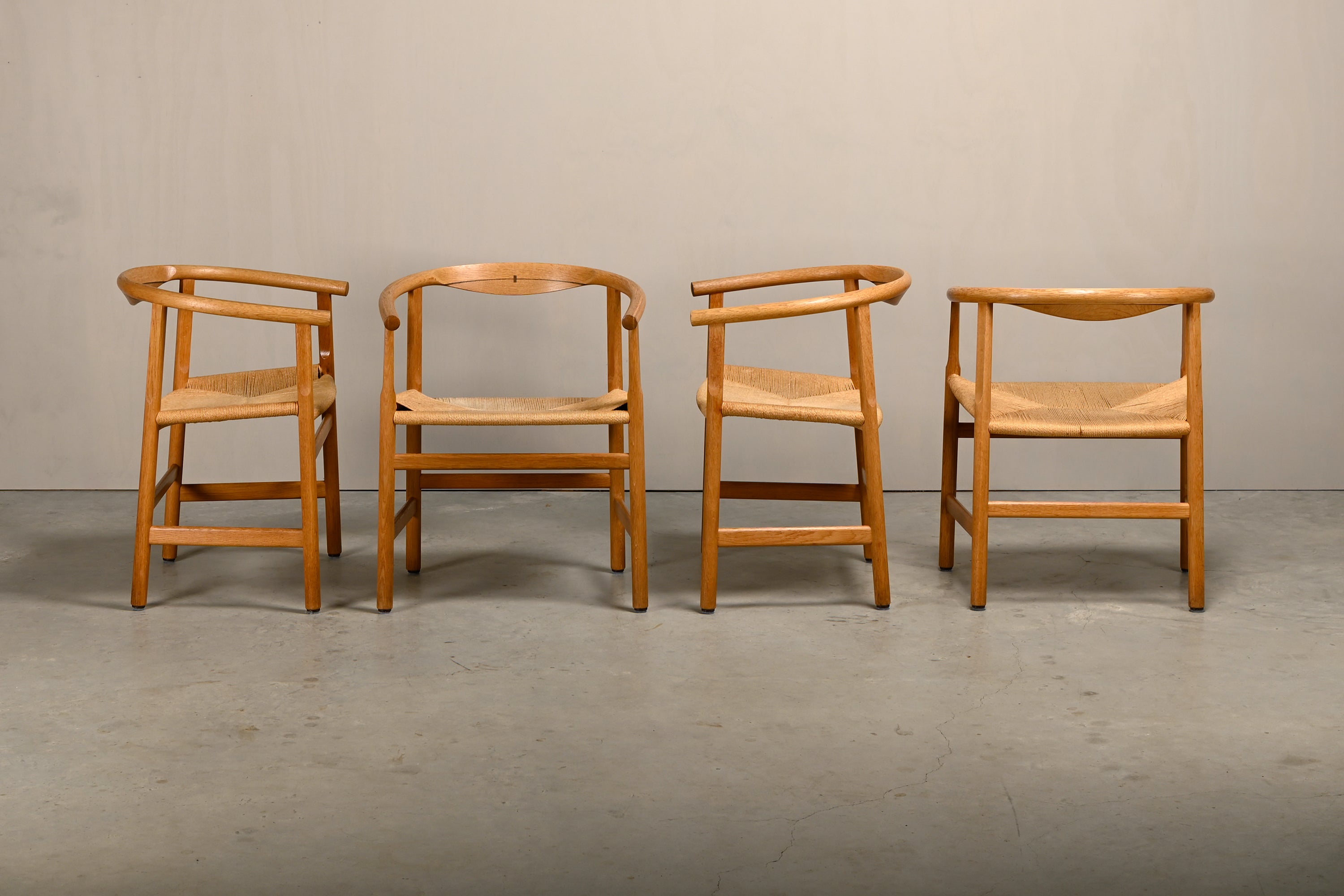 Set_of_4_Hans_J._Wegner_PP201_Dining_Chairs_for_PP_Møbler_in_Oak_and_Paper_Cord,_Denmark,_1970s