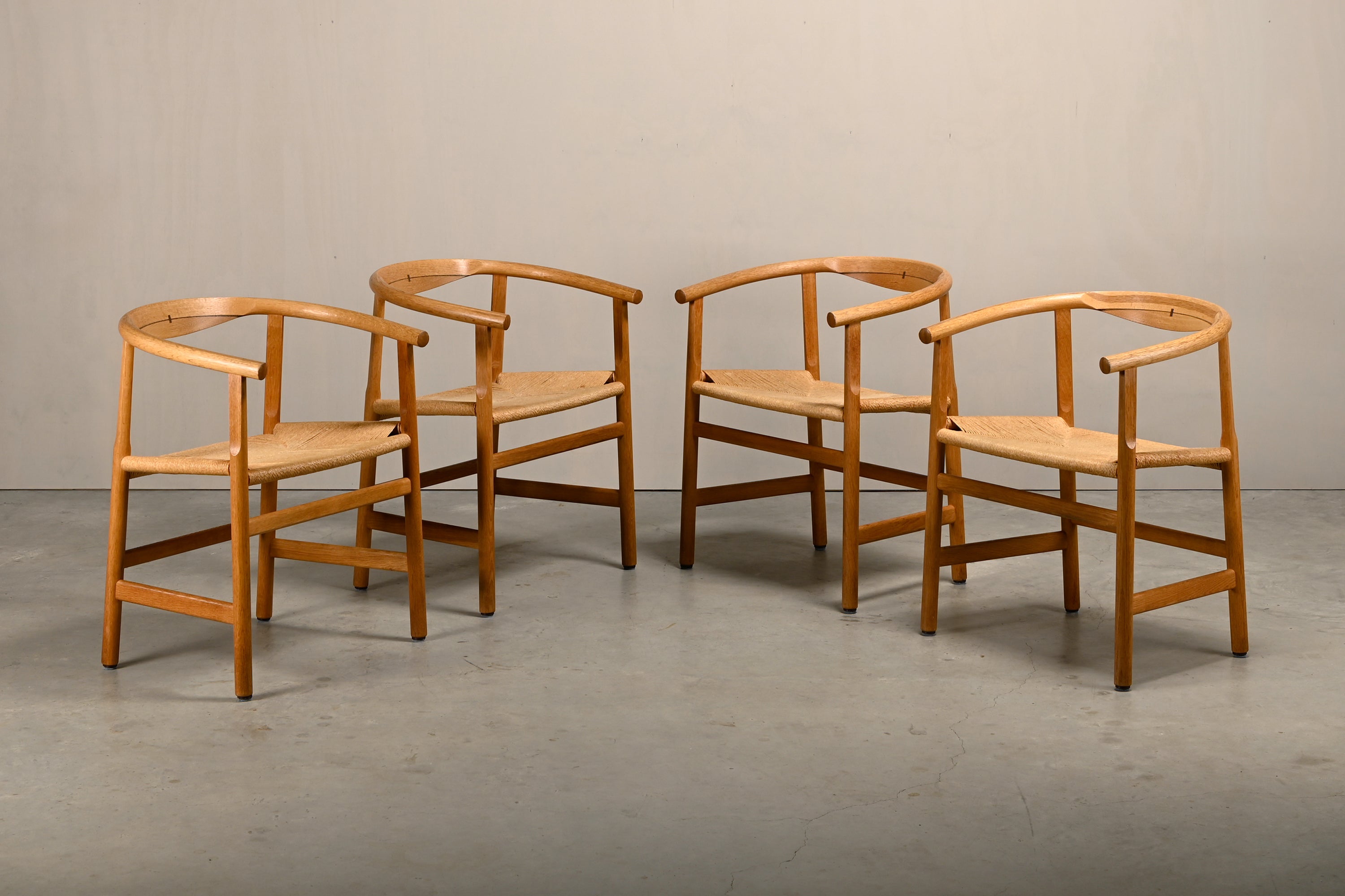 Set_of_4_Hans_J._Wegner_PP201_Dining_Chairs_for_PP_Møbler_in_Oak_and_Paper_Cord,_Denmark,_1970s