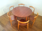 Set_of_Heart_dining_table_and_6_chairs_by_Hans_Wegner_for_Fritz_Hansen,_1952