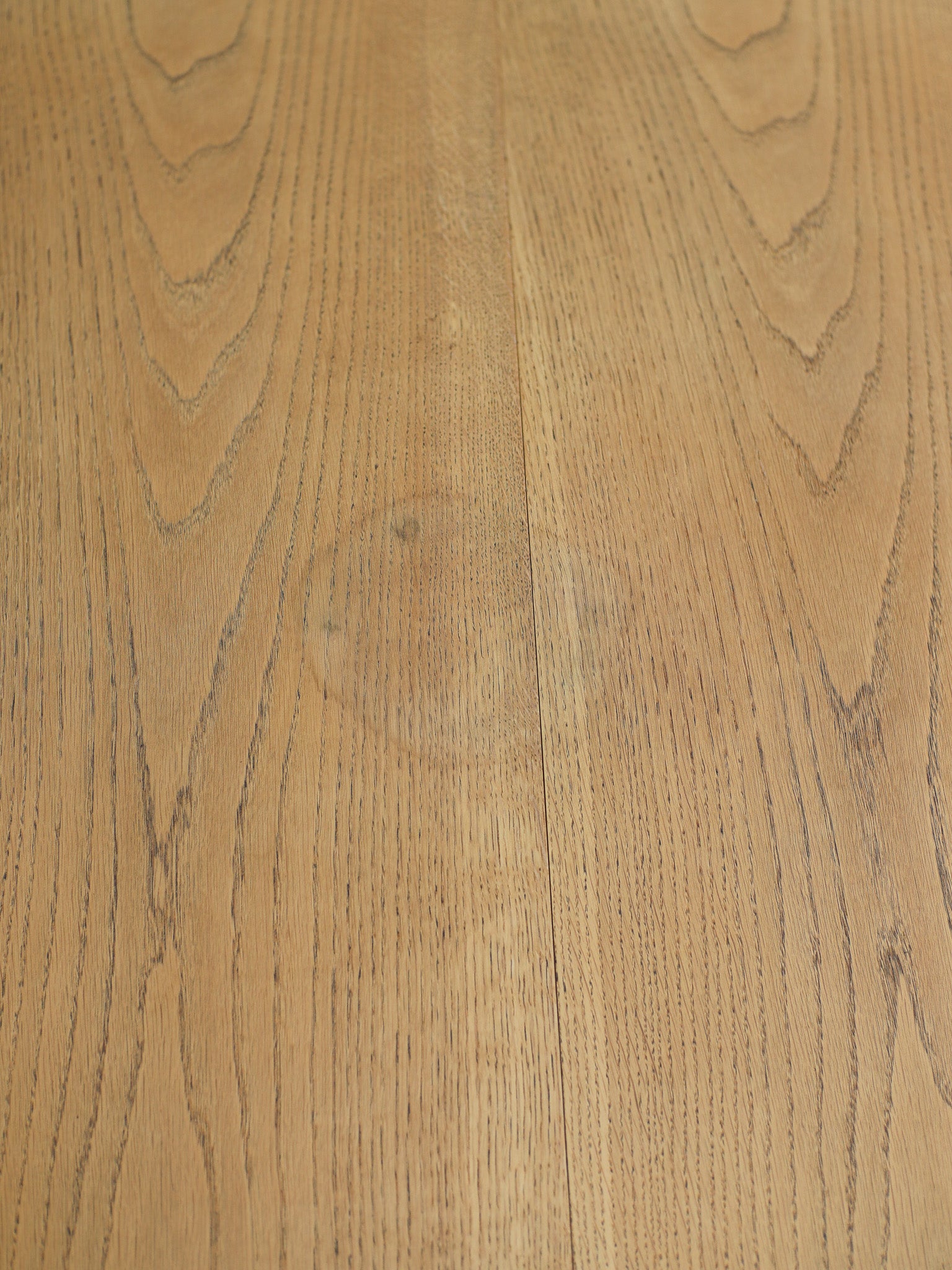 Henning_Kjaernulf_62_extendable_round_dining_table_for_Sorø_in_oak,_Denmark_1960s