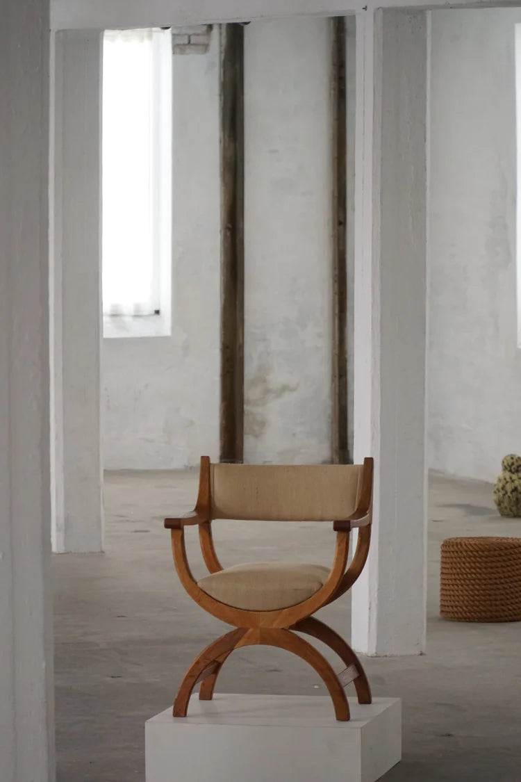 Henning_Kjærnulf_‘Kurul’_Armchair_in_Oak_and_Hessian,_Danish_Modern_Design