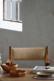 Henning_Kjærnulf_‘Kurul’_Armchair_in_Oak_and_Hessian,_Danish_Modern_Design