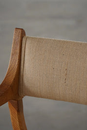 Henning_Kjærnulf_‘Kurul’_Armchair_in_Oak_and_Hessian,_Danish_Modern_Design