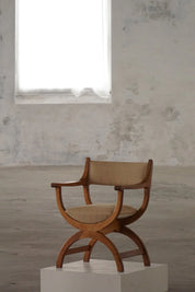 Henning_Kjærnulf_‘Kurul’_Armchair_in_Oak_and_Hessian,_Danish_Modern_Design